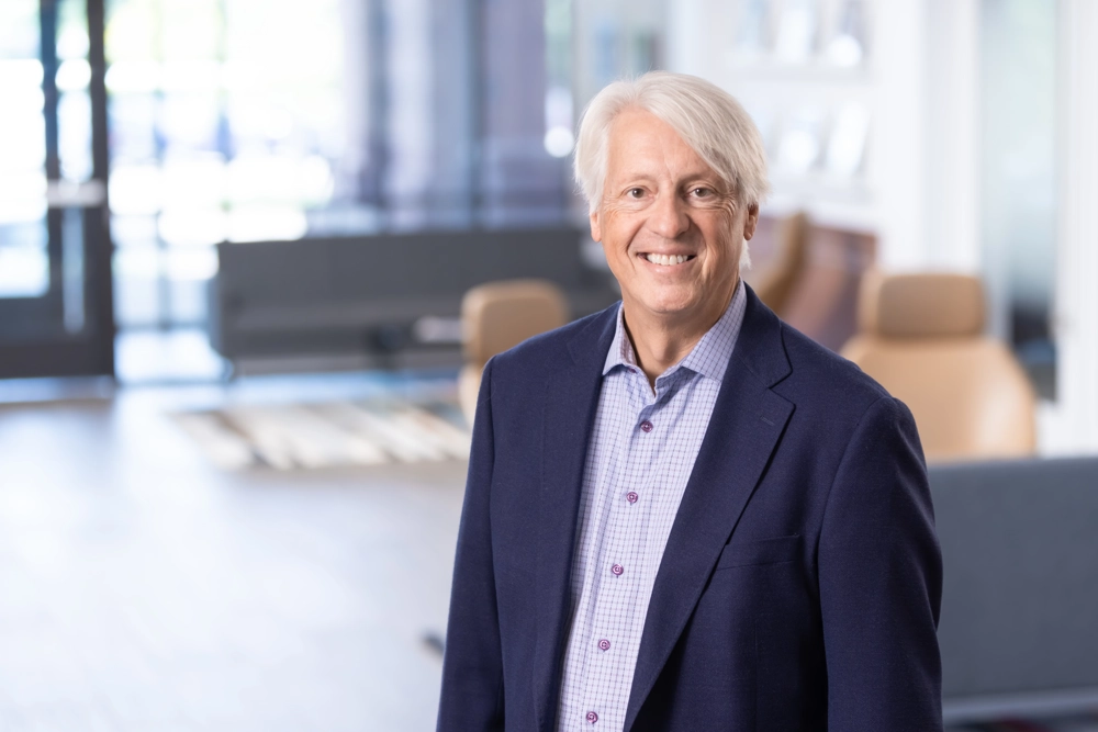portrait of a smiling person in professional attire